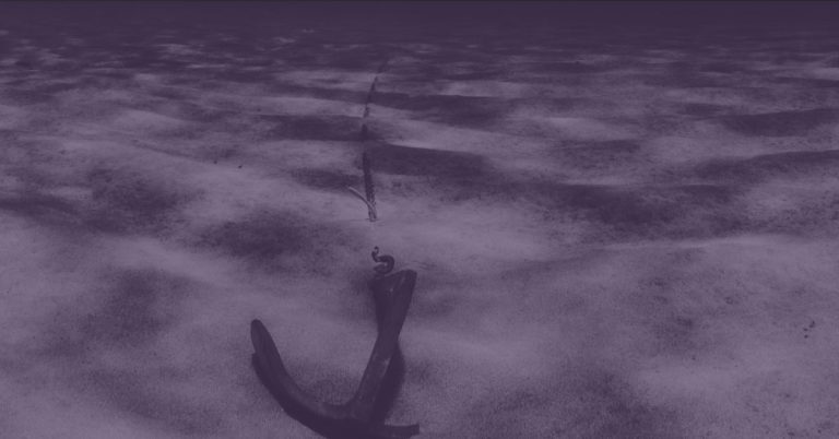 anchor at the bottom of the ocean with a dark purple overlay